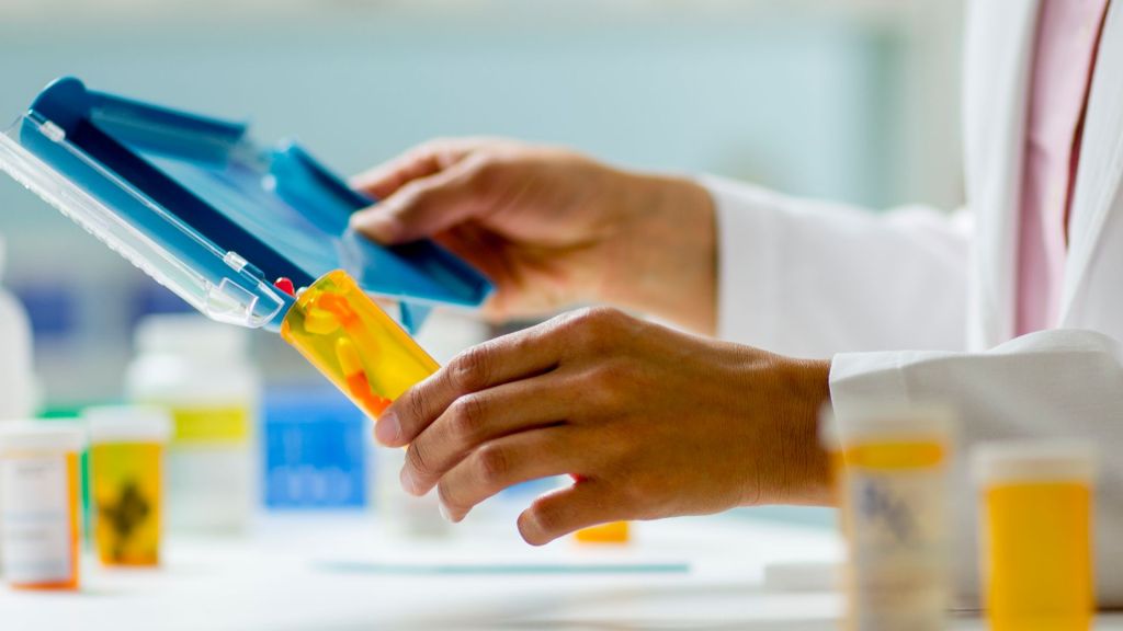 CVS and Express Scripts have filed lawsuits against Arkansas to block a law that prohibits pharmacy benefit managers from owning pharmacies.