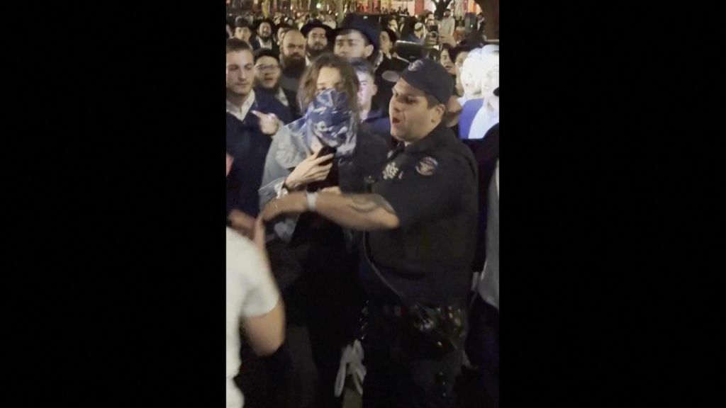 A group of Orthodox Jewish men chased and physically assaulted a woman through Brooklyn after mistaking her for a pro-Palestinian protester.