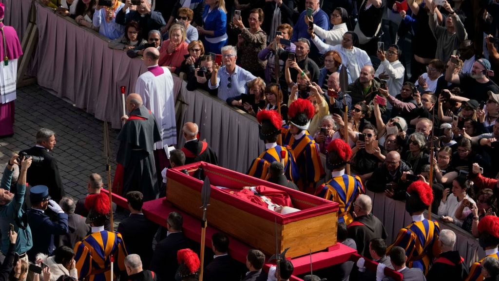 Tens of thousands of people wait to pay their respects to Pope Francis as he lies in state at St. Peter's Basilica in Vatican City, Rome.