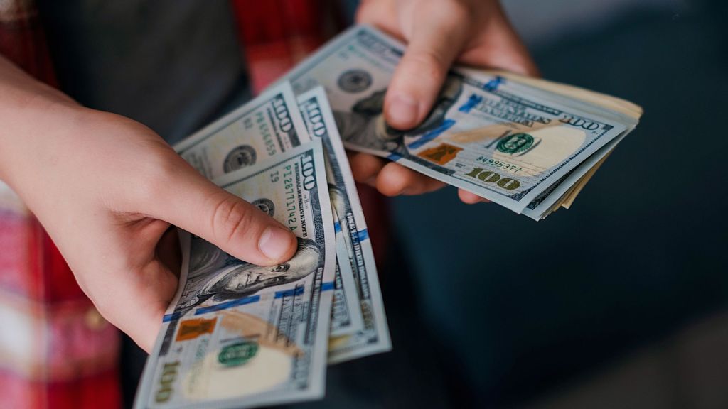 Federal investigators say drug cartels and Chinese groups laundered money through U.S. banks using fake companies and cash deposits.